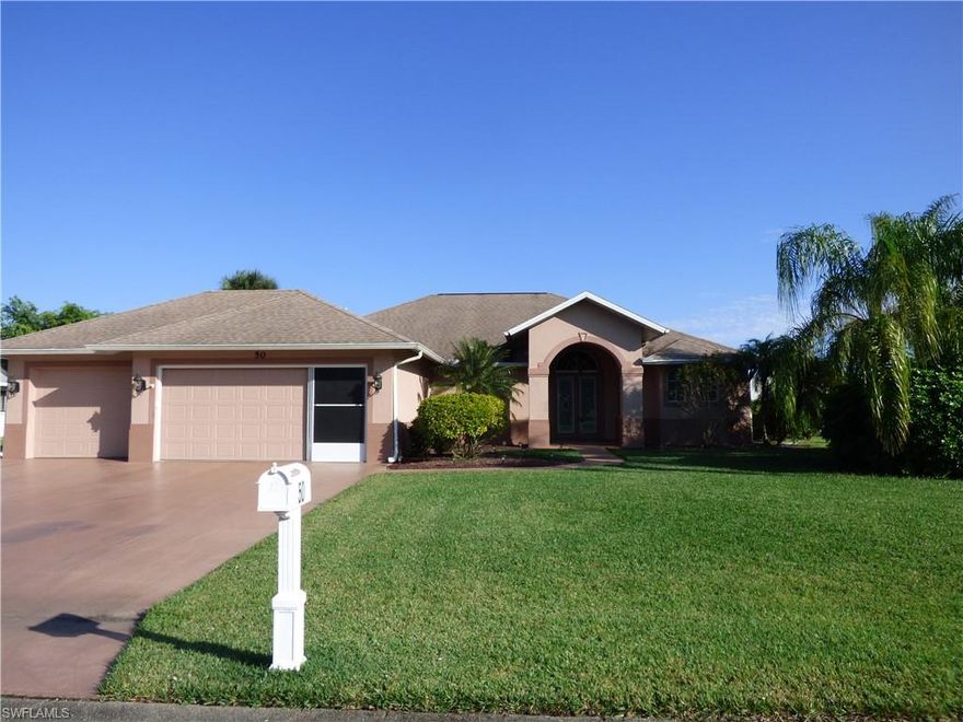 836 square foot oversized air conditioned TRIPLE garage w/ 240 volt electric hook up for RV, plenty of parking w/ RV drive, generator ready electric, epoxy seal coat on garage floor, 2000 square feet of living area, screen enclosed in ground heated pool w/ spa waterfall, fountain statues, plenty of covered patio area, excellent for entertaining, landscaped for privacy, pocket sliding doors to the pool area, new central heat and air 2016, new water heater 2013, soaring high cathedral ceilings, ceramic tile floors throughout, built in shelving with halogen lighting accents, solid surface countertops in kitchen with breakfast bar, walk in pantry, dinette area, stainless steel appliances with new LG French door refrigerator, indoor laundry room with new Maytag Bravos washer and dryer, master bedroom with tray ceilings, private master bath with dual sinks, separate garden tub and walk in shower, walk in closet, park like setting on beautifully landscaped corner lot in Country Club Estates with central water and sewer.