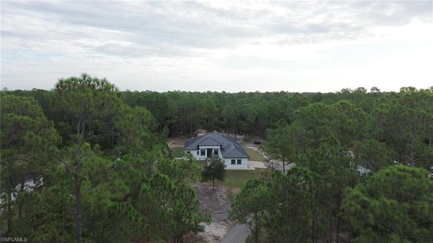 FOR SALE — 570 31st St NW, Naples, FL 34120 
A Rare Naples Acreage Estate With Pool, Spa, 3 Tiki Huts & Endless Potential**
Discover an exceptional Florida estate on over 2.5 acres in one of Naples’ most desirable and fast-growing areas. Located near the sought-after Weber neighborhood—not deep inside Golden Gate Estates—this property delivers land, privacy, and convenience with quick access to schools, shopping, I-75, and the Vanderbilt Beach Road extension now underway.
This beautifully maintained home has been freshly painted inside and out, features a new roof, cleared and graded land, and is fully landscape-ready for your vision.
The spacious layout includes:
• 3 bedrooms, 3 full bathrooms
• 2 dens / flex rooms
• Split-living design for maximum privacy
• Walk-in closets
• Wrap-around lanai with a rescreened pool cage
• Private pool with integrated jacuzzi spa
But what truly sets this property apart is the ultimate outdoor entertaining retreat:
 THREE completely redone Tiki Huts
Perfect for gatherings, outdoor dining, sunset lounging, or transforming into a private bar, cigar lounge, fitness/yoga hut, or play space. These tiki huts create a tropical resort-style experience right in your backyard.
Whether you’re hosting family events or building a personal oasis, the space is already curated for leisure and lifestyle.
The land is level, cleared, and ready, making it ideal for additional structures, workshops, guesthouses, or recreational setups — the possibilities are wide open.
This property combines the freedom of acreage with the convenience of city living:
• Near top-rated schools
• Minutes to shopping & dining
• Quick access to I-75
• Close to beaches, including Vanderbilt Beach
• Located in a high-value growth corridor
Homes with acreage this close to Naples are rare — and at this price, with motivated sellers, this is an opportunity you don’t want to miss. The home is being offered as-is, inviting the next owner to personalize and add their finishing touches.Sellers are highly motivated ,come and see for yourself all reasonable offers accepted. More images will be uploaded soon.