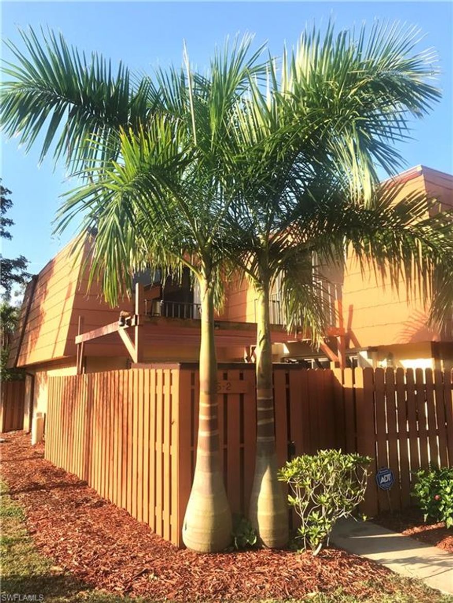Set in a popular neighborhood community, this meticulously maintained  2-bedroom, 2-bathroom townhouse combines comfort, convenience, and style. With plenty of features and a great location, this home offers a great Florida living experience. The master and guest bedrooms are spacious, have ample closet space, and have their own balconies perfect for relaxation. You'll find lots of storage space throughout. The kitchen is bright and updated, with all the appliances you need and plenty of cabinets. Downstairs, there's a laundry room and bathroom for convenience. The living area is pleasant and inviting, especially with its fireplace and multiple sets of sliding doors leading to a private fenced courtyard, perfect for indoor-outdoor living. Enjoy peace-of-mind knowing home has new roof (2023), New AC (2023), new fence (2024), and easily deployed accordion-style hurricane window protection. This townhome is a fantastic find located with easy access to lots of shopping, restaurants, entertainment, and more.
