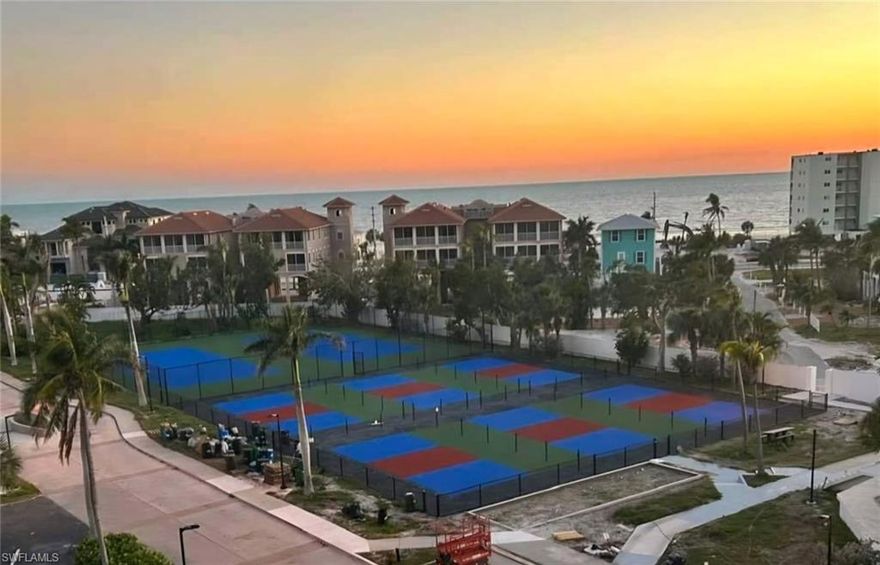 Perfect opportunity to get the best value in Ocean Harbor (and on Fort Myers Beach)! This gated community offers great amenities for true resort style living. Kayak storage & Launch on back bay, 6 pickle ball courts, 2 tennis courts, resort style pool, 2 spas, grills, bocce ball, fishing pier and community center. Walk across the street to the Gulf of Mexico, or next door to Publix, Junkanoo, Fresh Catch and Snook Bite marina. This stunning condo offers 2 bedrooms (one primary and one Jr Suite) and 2 baths with over 1300 sq ft. Beautiful updates include granite countertops, custom cabinets, and top-of-the-line stainless appliances complete with a Bosch hood, stovetop, dishwasher and oven. The large living room and dining area provide plenty of space for gathering with friends and family. Both bathrooms have been fully updated with custom cabinets, walk-in showers and granite countertops. The main bathroom also includes laundry for added convenience. The jr. suite features a second bedroom with a walk-in closet and a guest bathroom. Enjoy breathtaking views of the sunset from the large lanai. Premium parking space close to the entrance & storage cage are included! One of the few gated communities on the Island!! Boat docks available for purchase.