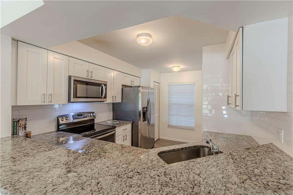 Photo of 9600 Victoria LN #108, NAPLES, FL 34109 (MLS # 226027010)