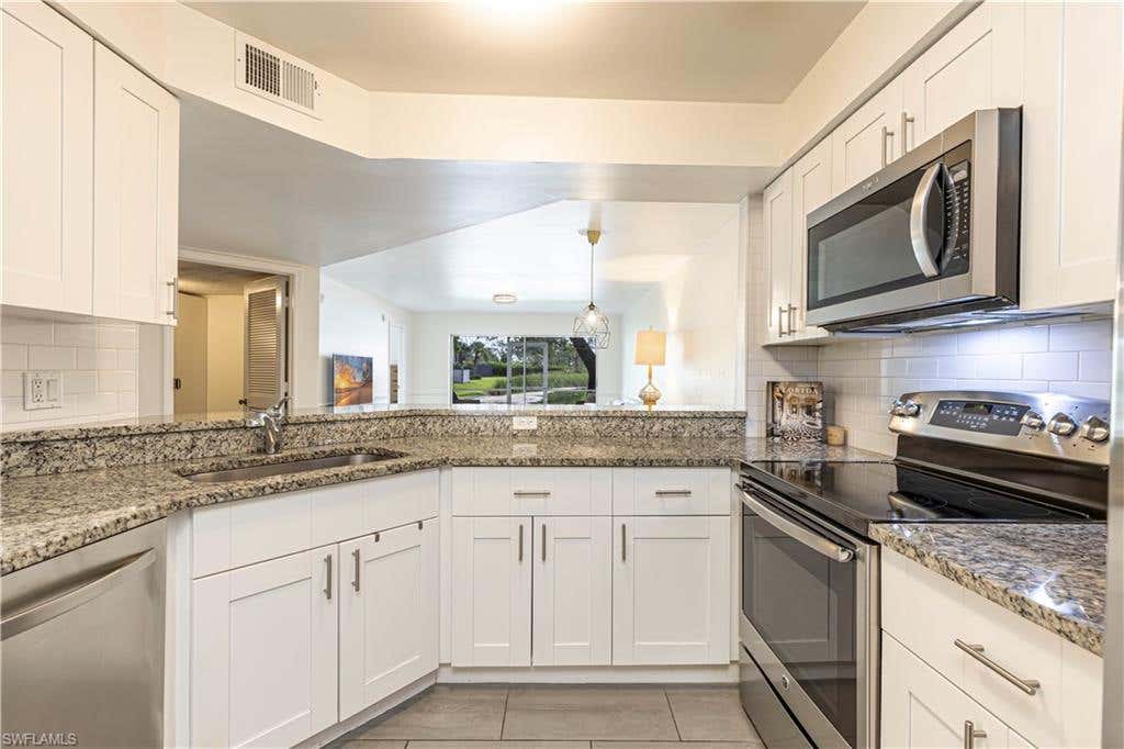 Photo of 9600 Victoria LN #108, NAPLES, FL 34109 (MLS # 226027010)