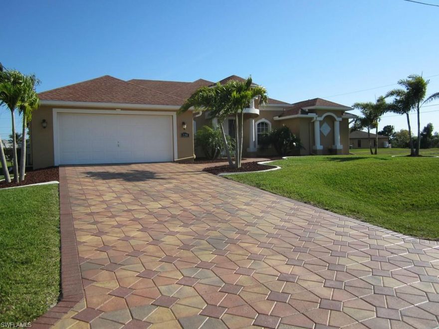 This Home is a One of Kind!!! Absolutely Beautiful!!! Located close to Coral Oaks Golf Course and tucked into a small neighborhood, this home will Amaze you!!!  Corner lot property with an expansive lanai with plenty of room to entertain.  The beautiful tile floors resemble marble and are throughout the property.  This home features tray ceilings in ALL bedrooms and the great room. Both bathrooms feature custom tile work on all the walls and must be seen to believe.  Kitchen has gorgeous granite counters and custom cabinetry.  This property is truly unique in all of the special touches and upgrades!!! Call now to make your private showing appointment.