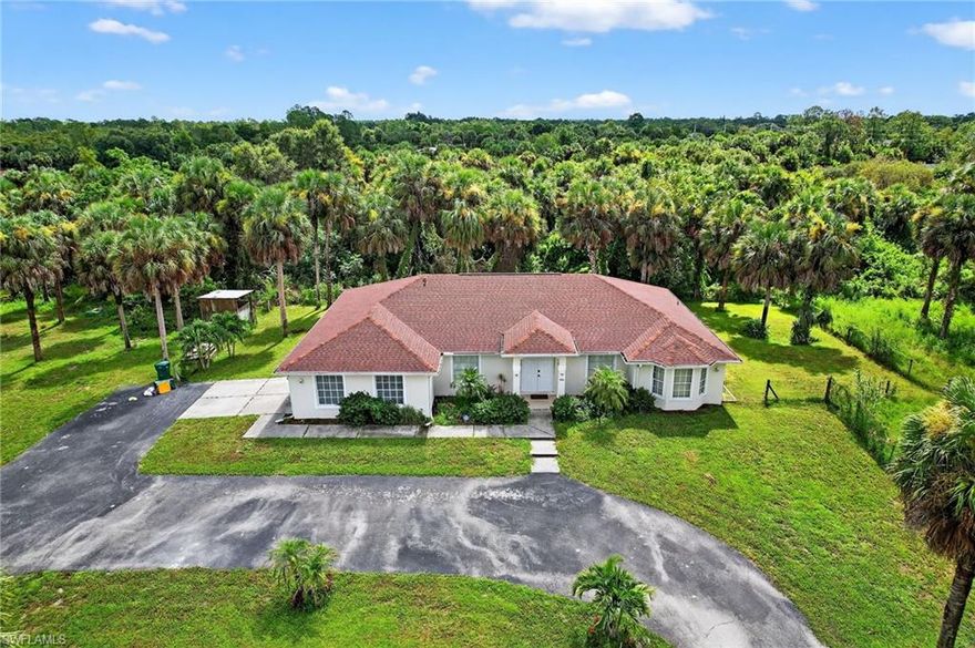Wow! Annual Rental Opportunity – Just Like New 4BR/2BA Home on 2.73 Acres!
Turnkey furnished and move-in ready! This beautiful, “just like new” single-family home sits on a spacious 2.73-acre lot with no HOA, giving you plenty of privacy and room to enjoy the Florida lifestyle.
The home features a bright, open floor plan with 4 bedrooms and 2 updated bathrooms. The kitchen and baths have been beautifully refreshed with granite countertops and tile flooring throughout. You’ll love the stainless steel appliances, newer washer and dryer, and the convenience of a 2-car garage plus a circular driveway for easy access and guest parking.
Recent major updates make this home truly worry-free:

New roof (2024)
New A/C (2024)
Irrigation system (2024)
Water heater (2020)
Portion of the property is fenced

Additional features include an ADT alarm system pre-wired with cameras for added peace of mind. The property is in an X flood zone, offering extra reassurance.
Location is fantastic – just minutes from everything you need:

5 minutes to Brooks Village Plaza with Publix, pizza, and daily conveniences
10 minutes to Physicians Regional Hospital and I-75
15 minutes to Pine Ridge Crossing Plaza featuring Target, Publix, banks, restaurants, medical offices, and Costco
Nearby Pebblebrooke Plaza with even more shopping and dining options

This is truly a turnkey, furnished rental where everything is included and ready for you to move right in. Perfect for those seeking a modern, low-maintenance home in a convenient Naples-area location with room to spread out.
Don’t miss this rare opportunity on 2.73 acres with no HOA! Schedule your showing today – these don’t last long.