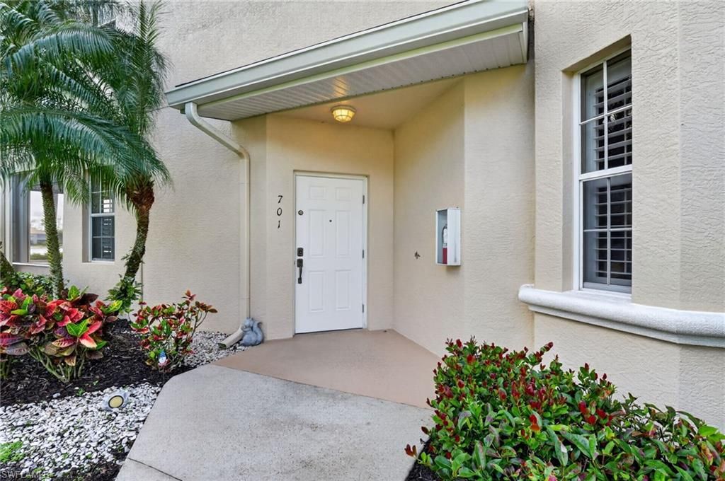 Photo of 6285 Wilshire Pines CIR #701, NAPLES, FL 34109 (MLS # 226014595)