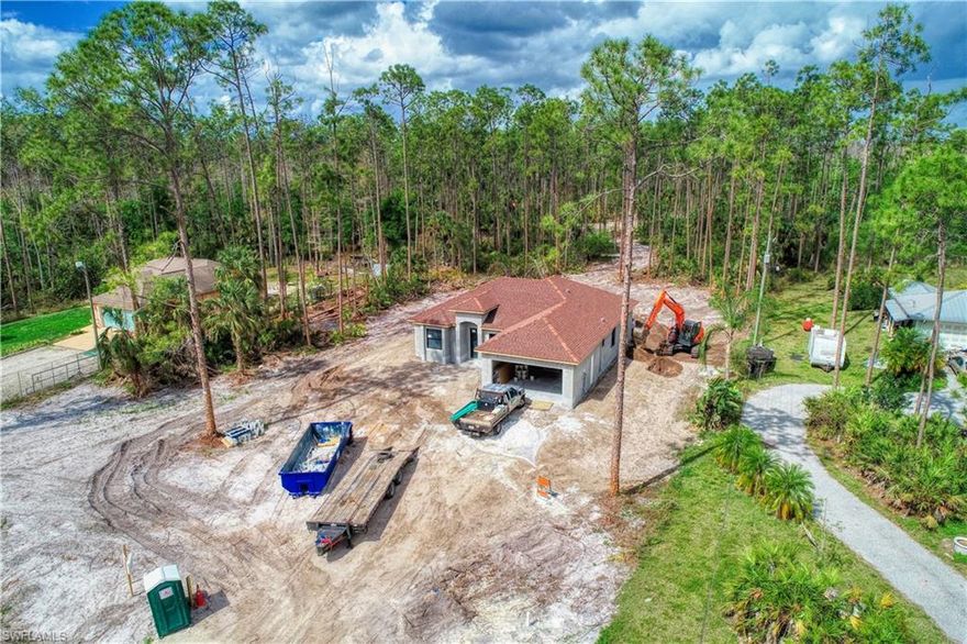 Look closely at the quality and details of this BRAND NEW home situated on spacious 2.27 acres of upland right here in paradise. Come, fall in love with this ideal, liveable floorplan with over 1500 square feet of air-conditioned living space. You'll agree with this home if you're looking for new construction features like impact windows and doors for your protection. This concrete block structure is built to today's hurricane specifications.  More features and high-quality finishes have been included making this home the perfect value. Having the ideal balance of new home and land there's plenty of room to grow or add a pool. Some of the features include 10-foot ceiling height, additional insulation in several walls for sound dampening, high-efficiency HVAC system, new stainless steel appliances, 42-inch soft close cabinets, granite counter tops, gutters, garage door opener and more. The attention to detail and the features list goes on and on. Even your private septic system has been placed in the rear for magnificent curb appeal. This home should be completed in the next 60 days! Come see why this home will be your first choice and enjoy the quality of life and home you deserve.