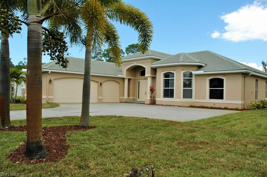 GREAT home in the very desirable Paradise Woods.  Great floor plan with pool.  Three bedroom plus den/office, two full bathrooms, and three car over sized garage with tile roof.  Beautiful pool, with pavers on the lanai and a New pool cage.  Enter the lanai from the master bedroom, bedroom #2, pool bathroom or great room.  This home has a New pool cage, New A/C, New appliances, New washer and dryer, New carpet in the bedrooms, New high quality paint inside and outside.  New landscaping and New sod.  Lots of other New items.  You walk through the front doors of this home onto 20" tile with a fantastic view of the pool and lanai.  Very low HOA fees in a HOA friendly community.  This home is MOVE-IN-READY!  You must see to appreciate.  Quick response from seller.