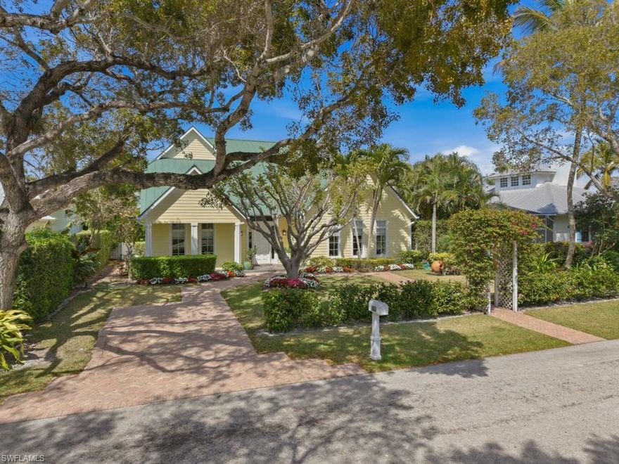 Ideally located in the heart of Olde Naples along a charming tree-lined street, this custom two-story residence offers timeless design just moments from the Gulf of Mexico and the renowned dining and boutiques of 5th Avenue South and 3rd Street South. Thoughtfully designed for both comfortable living and entertaining, the home features 4 bedrooms plus a den, 4 full bathrooms, a powder room, and a separate pool bath, with a spacious first-floor primary suite.
Interior features include marble, wood, tile, and carpet flooring, volume and tray ceilings, custom built-ins, and a fireplace in the great room. The well-appointed kitchen offers granite countertops, stainless steel appliances, imported wood cabinetry, and a gas cooktop, opening seamlessly to the main living areas.
French doors lead to a beautifully landscaped outdoor living space with a heated pool and spa, ideal for entertaining or relaxing in a private setting. The primary suite enjoys access to a private garden retreat, creating a peaceful extension of the home’s outdoor living.
Additional highlights include a 2-car attached garage, metal roof, impact-resistant doors and windows, security system, fully fenced property, and a whole-house generator installed in 2021.
Offering comfort, privacy, and an exceptional location, this residence captures the essence of the Olde Naples coastal lifestyle.