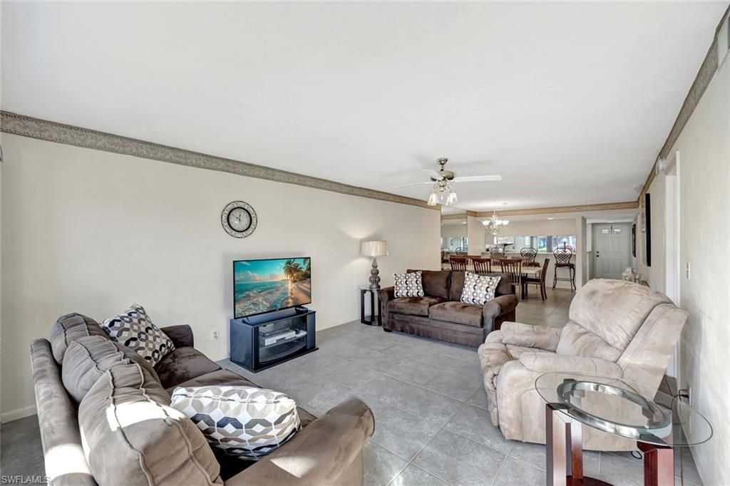 Photo of 4150 Looking Glass LN #5, NAPLES, FL 34112 (MLS # 225083101)