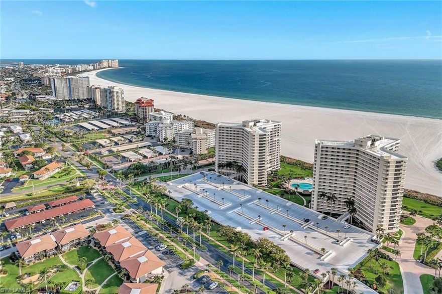 Enjoy stunning paradisiac and gulf views the moment you step into this two-bedroom, two-bath condominium on the third floor, and right on the famous white sandy beach of Marco Island. Wood floors in main area, tray ceiling and recess lighting in kitchen. Convenient walk-in showers in both updated baths, plus storage and high-impact windows for extra peace of mind. Sit down and relax on your open balcony, savoring a morning coffee or a happy hour drink and be mesmerized by the captivating sounds of the gulf, tropical scenery and exotic birds flying by. The building has been completely renovated and offers a phenomenal fitness center, media and social room, mailroom with Amazon Hub and more. South Seas is the only community on Marco Island offering beach and bay access with boat docks available for lease. Beautiful manicured landscaped grounds and great amenities including pool, tennis and pickleball courts, kayak and bike storage, shuffleboard, barbecue-picnic area, and on-site management. All this is in a centrally located 24-hour staffed gated community, close to shops and restaurants. An open canvas ready to make it your piece of paradise.