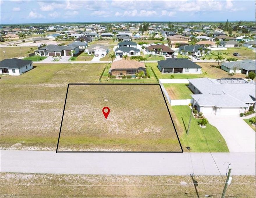 Oversized Triple lot in an up and coming popular area of Cape Coral. This Western exposure lot offers the perfect opportunity to build your dream home among beautiful higher- end new construction homes. Situated across from Gulf Access properties, this lot is mostly cleared and waiting for a new owner who may want to build a larger scale pool home with plenty of space for boat or motorhome storage.