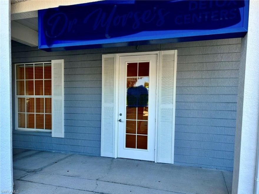 $18/SF plus $5.56/SF OPEX. BASED RATE 2024. 3659SF.  Lease rate dependent on lease term. Unit 7 has a spacious waiting area with reception and private office, 9 additional offices, Conference room, 2 restrooms and a kitchen. The conference room features raised ceiling, solid wood cabinets, granite counter tops and a sink. Murdock Town Center is located in the business hub of Charlotte County’s retail, service, education and County administration. This location is easily accessed directly off Tamiami Trail (41). Center features dual access, ample parking, fresh Florida color scheme and mature palms in lot.