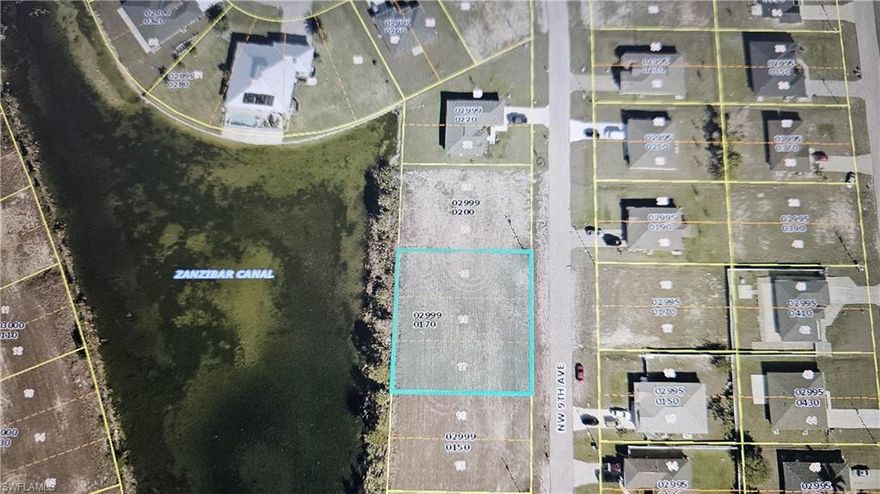 This beautiful Waterfront property. Build your dream home in this triple lot, or invest in one of the fastest growing areas with newer homes in Lee County. This location only minutes to Coral Oakes Golf Course, the City Boat Ramp and Pine Island Road, which provides access to many shops, restaurants, and retail centers! Easy access to Fort Myers without paying a toll.