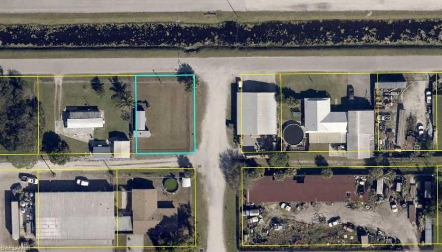 75x100 ft. INDUSTRIAL ZONED LOT, City of CLEWISTON. RARE FIND! Completely Chain-link fenced and has electric meter. GREAT FOR STORAGE, TRUCKS, BUILDING A SHOP OR SMALL WAREHOUSE.