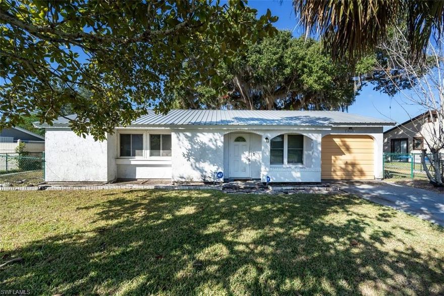 Welcome to this charming 3-bedroom, 2-bath home located in the desirable Port LaBelle community. This property features a 1-car garage and a durable metal roof, offering both peace of mind and long-term value. The fully fenced yard provides privacy and plenty of space for pets, play, or entertaining.

Step out back and enjoy the serene setting with a beautiful oak tree and a greenbelt behind the property, no rear neighbors for added privacy and a peaceful outdoor retreat. Whether you’re relaxing under the shade or hosting family gatherings, this backyard is made to be enjoyed.

Perfect for a starter family or first-time homebuyer, this home offers comfort, functionality, and a quiet location while still being close to schools, shopping, and local amenities. Don’t miss the opportunity to make this Port LaBelle gem your own!