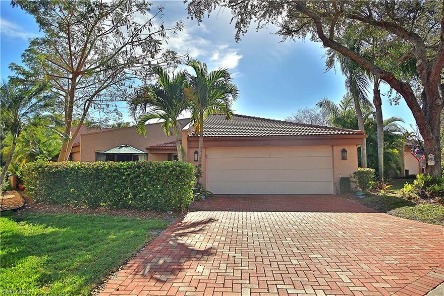 RARE Four Bedroom, 2.5 bath Detached Villa w/ oversized attached two car garage!  Spacious, Comfortable home with volume ceilings, great for entertaining with two large living areas.  Updated Kitchen includes granite countertops,  stainless steel appliances, and a decorative designer hood.  A glass enclosed breakfast room is an ideal added feature!  18" tiles on diagonal throughout.  New brick paver drive-way and private patio area. Newer air conditioner, and hot water heater.  Well maintained!  The Landings Yacht Golf and Tennis Club is one of the most prestigious communities off McGregor.  Enter through the guarded gates into lush landscaped grounds.  Amenities include Full Service MARINA with a boat-slip up to 60', (if available) with GULF-ACCESS! UNLIMITED Golf, Tennis, Pickle-ball, Fitness Center, TWO Restaurants, bocce-ball, activities and Clubs!