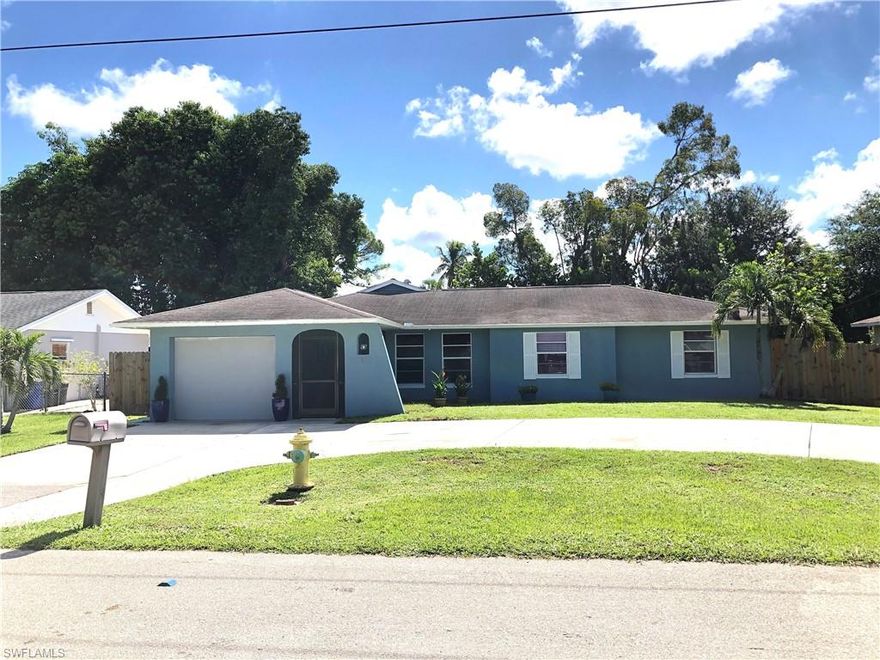 This home is move-in-ready, beautiful kitchen with granite counter-tops, all stainless steel appliances including range hood and ceramic tile flooring in kitchen, dining and living room. Spacious oversized master bedroom with sitting area and/or room for office, bamboo floors plus a closet and a walk-in closet. When you enter home there's an entry foyer into the living room with a formal dining room to the left, then the kitchen and a breakfast area to the right or it can be used as a sitting area/office or however this home fits for you. The completely fenced in backyard is a beautiful private oasis with hammock area. Sunbath on a wooden deck or have a BBQ. Large screened in lanai and even larger brick paver patio area so you can cook on your propane grill complete your beautiful backyard for year round enjoyment. This home is close to nearby shopping center and restaurants as well as Bonita Springs Library, Community Pool, Dog Park and the Bonita Springs Downtown District.