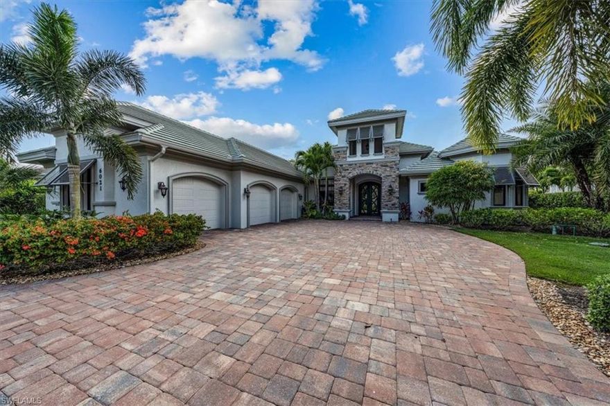 H3849- This sensational home by Florida Lifestyle, perfectly situated on a west facing lot with glorious golf course and sunset views, includes a House membership with assessment fully paid! The grand double door entry and freshly painted exterior welcome you while the striking ceiling effects, chiseled edge stone flooring, custom trim work/crown molding and professionally decorated rooms delight at every turn. The spacious kitchen with double island is the heart of the home and a cook's delight while the master ste provides a relaxing oasis with private french doors opening to the lanai. You’ll appreciate the generous size of the walk-in master closets, lavish soaking tub, large walk-in shower plus double vanity and make-up vanity. Enjoy Florida life from the expansive lanai featuring a heated saltwater pool with grotto/waterfall and integrated spa. The covered outdoor kitchen and bar area plus various outdoor seating areas are enhanced with rich wood ceilings for graceful outdoor
living and entertaining. Additional features include instant hot water system, electrostatic air cleaning system with UV light, Ruffino kitchen cabinetry, upgraded landscape lighting and so much more.