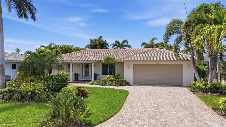 Instantly feel at home in this timelessly designed, custom-crafted waterfront residence located in the highly desirable Fairview Isles of Fort Myers Beach. Perfectly positioned on one of the WIDEST & DEEPEST CANALS on the island, this exceptional home offers DIRECT GULF & (Estero) BAY ACCESS, along with a 16,000-lb COVERED UPGRADED BOAT LIFT+DOCK—a boater’s dream. Proudly owned and meticulously maintained by a custom high-end home builder+designer, the residence reflects thoughtful craftsmanship and quality throughout. The custom chef’s kitchen is appointed with quartz countertops, premium finishes, and flows seamlessly into the main living areas, highlighted by oversized 24x24 porcelain tile flooring, a refined neutral color palette, and sophisticated coastal accents that define true coastal elegance. Every inch of the home has been carefully curated to fit the space perfectly, & the sellers are even offering the premium, designer furnishings to remain in the home for the new owner. IMPACT-RESISTANT GLASS throughout the home, as well as a custom flood barrier protection system provides both security and peace of mind. Designed for indoor-outdoor living, the expansive screened lanai offers an inviting space to entertain or relax, complete with a LARGE HEATED POOL & WATER VIEWS. Lush tropical landscaping surrounds the property, enhancing privacy and curb appeal. Additional upgrades include water softener and reverse osmosis drinking water system, newer AC, new water heater. This home has been lovingly cared for and is truly move-in ready—ideal for buyers who appreciate superior construction, timeless design, and waterfront living at its finest. New owners will love the ability to walk to Gulf beaches, stroll the quiet neighborhood, bike to Santini Plaza, & enjoy true Florida living on an island that has been restored better than ever. (See link for dimensions, virtual tour, & video).