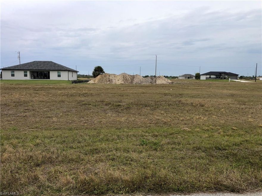 Location Location Location. Check out this serene property in Cape Coral's Northwest. This building site would be perfect for new construction. There are many new homes going up in the area.  This parcel is convenient to the city golf course as well as the airport. Consider this property today either for investment or new construction.