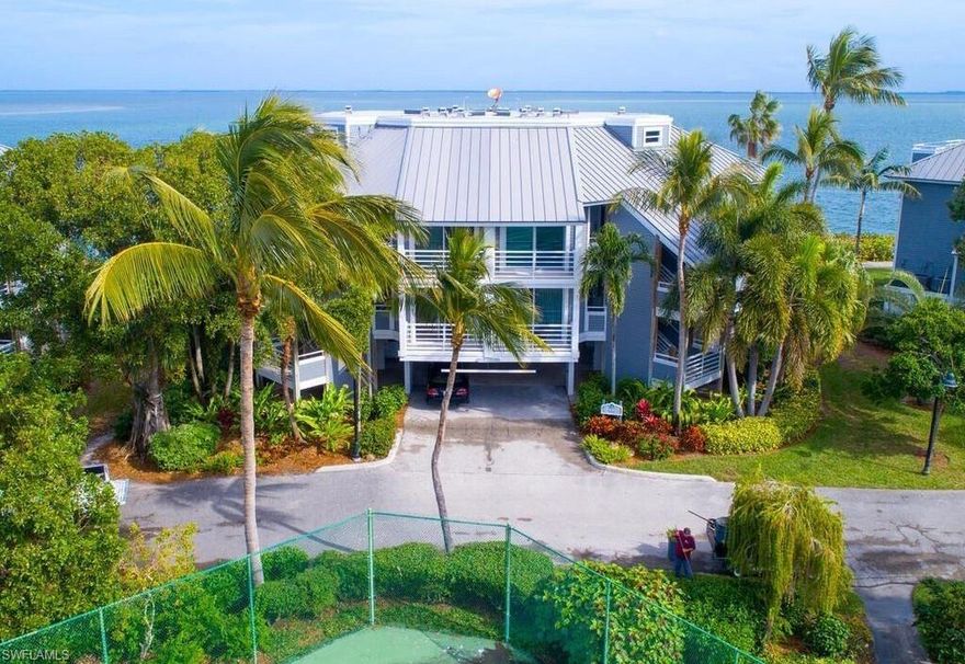 Fabulous, 3 bedroom, 3bath plus Den/4th bedroom Lands End Village condo. Meticulously renovated in September 2017 from the studs out, including enlarged inside living space, engineered wood flooring 3/4" with sound deadener, Hurricane door/walls, built-in closet systems, fire suppression system, 2energy efficient heat pumps and much more. Elan 'Smart House System', includes entertainment, climate, security and lighting. Relax while listening to your favorite music with the Sonos sound system. All new appliances, including an induction cooktop. Astonishing views from the master bedroom lanai of Pine Island Sound, Redfish Pass, southern point of North Captiva and a partial view of the Gulf of Mexico.