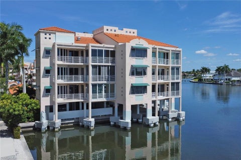 Photo of 4500 Gulf Shore BLVD N #1-211, NAPLES, FL 34103 (MLS # 226035228)