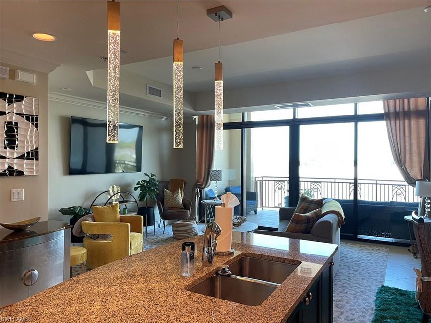 Discover an elevated Naples winter retreat where city energy meets coastal living. This upscale turnkey 2-bedroom, 2-bathroom residence on the 4th floor offers a well-designed split floor plan and beautiful sunset sky views from your private lanai.
Enjoy unmatched convenience with premier dining, boutique shopping, a luxury movie theater, fitness studios, nightlife, and Whole Foods just an elevator ride away. Located in the heart of Mercato, one of North Naples’ top lifestyle destinations, residents can enjoy year-round events, live music, seasonal celebrations, and a vibrant social scene right outside their door.
The spacious primary suite features a large walk-in closet and oversized bath, creating a private retreat. The guest bedroom also offers its own walk-in closet and generous bathroom, giving visitors comfort and privacy.
Residents of Strada at Mercato enjoy exclusive rooftop amenities including a 52-foot heated pool, expansive sun deck with gas grills, fire pit, relaxing hot tub, renovated clubhouse with catering kitchen, and a modern fitness center. Minutes from Naples’ white-sand beaches, golf, and the best of North Naples, this is the perfect place to experience the Naples lifestyle and enjoy the best of both worlds.