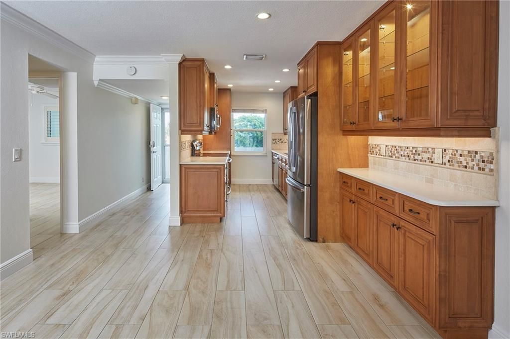 Photo of 3100 Binnacle DR #305, NAPLES, FL 34103 (MLS # 225060845)