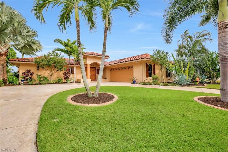 BOATERS PARADISE, keep your BOAT out back on 15K LB LIFT under CANOPY, YOUR NEW HOME is just minutes to the RIVER and on to the GULF OF MEXICO - SANIBELL & CAPTIVA. COMPLETELY UPDATED with all the BELLS and WHISTLES:  IMPACT WINDOW & SLIDERS (POCKETED), OUTDOOR KITCHEN, HARDWOOD FLOORS, VAULTED CEILING in GORGEOUS KITCHEN, EXTERIOR PAINTED 2016 and so much more!  RELAX by the HEATED POOL or sit on the DOCK and watch the BOATS drive by.  SELLERS will provide BUYER with HOME WARRANTY with FULLPRICE OFFER.  CALL TODAY FOR YOUR PRIVATE SHOWING.