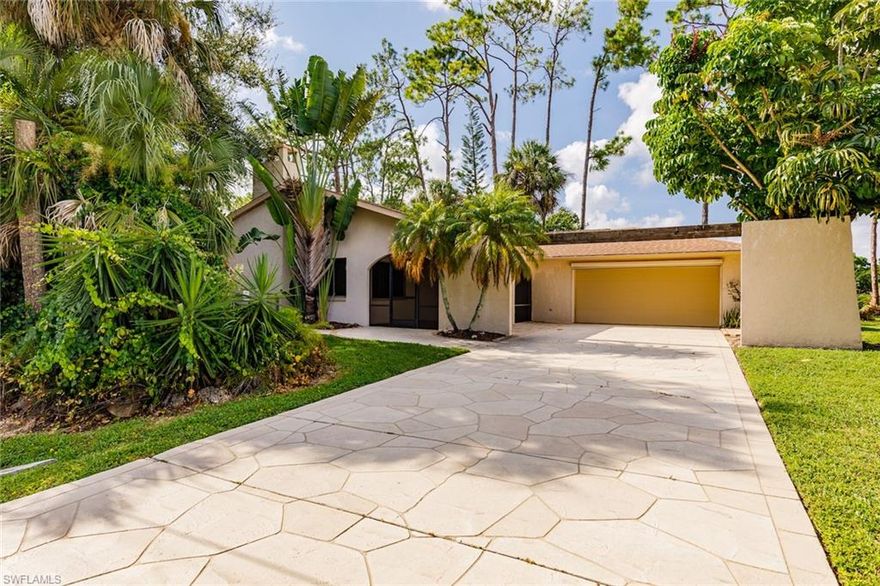 Great family home with wood-burning fireplace in Greatroom. Palm River on large corner lot, easy access to Mercato, beaches, and I-75. Master bedroom and bath added 2002 with separate AC, French Doors to pool lanai. 18" tile flooring throughout the home. New Stainless appliances in Kitchen. Private pool and and courtyard patio, paved walkway around the house, private outdoor living with huge screened front porch. Ceiling fans in every room. Park/walkway area provides privacy from Immokalee Road.