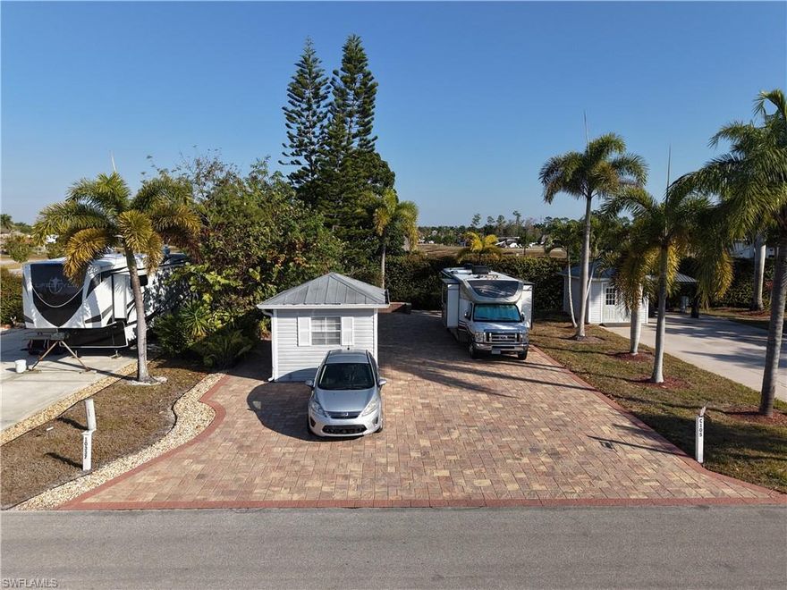 Welcome home to Lot C105!!!  Beautiful paver lot with knee wall, mature landscaping and finished accessory building.  Sit back and relax in the Florida sun, and call Cypress Woods RV Resort your home.  The accessory building is finished with toilet, sink, cabinets, air conditioning, and futon.  This luxury ownership resort has a abundance of amenities, pickleball, tennis, shuffleboard, and activities galore.  The Welcome Center has resort offices, card room, fitness room, laundry, and pool/ hot tub.  The Town Center has large meeting room, catering kitchen, card room, craft room, and pool/hot tub which is where all large gatherings happen.  Come and see what South West Florida has to offer!!!