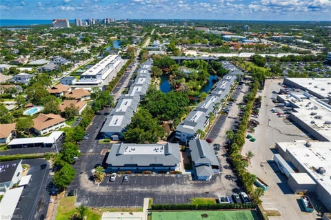 Photo of 600 Neapolitan WAY #153, NAPLES, FL 34103 (MLS # 226031635)