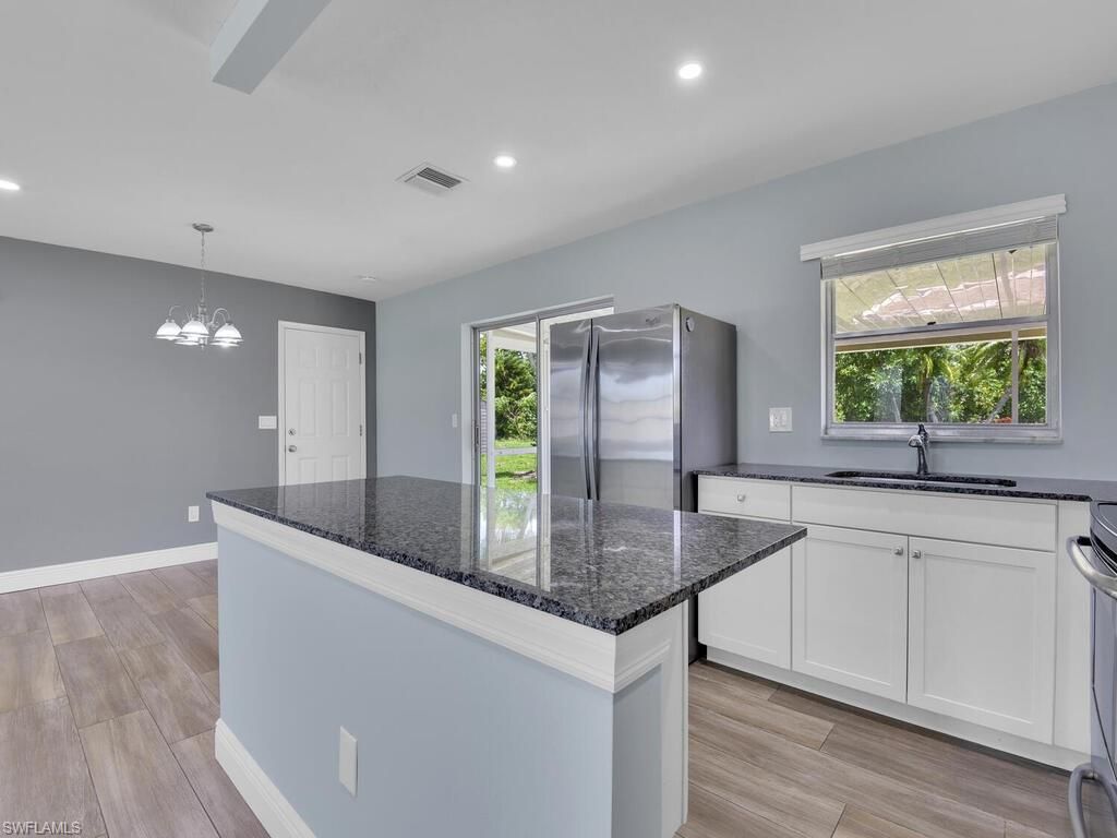 Photo of 1958 41st TER SW, NAPLES, FL 34116 (MLS # 226015297)