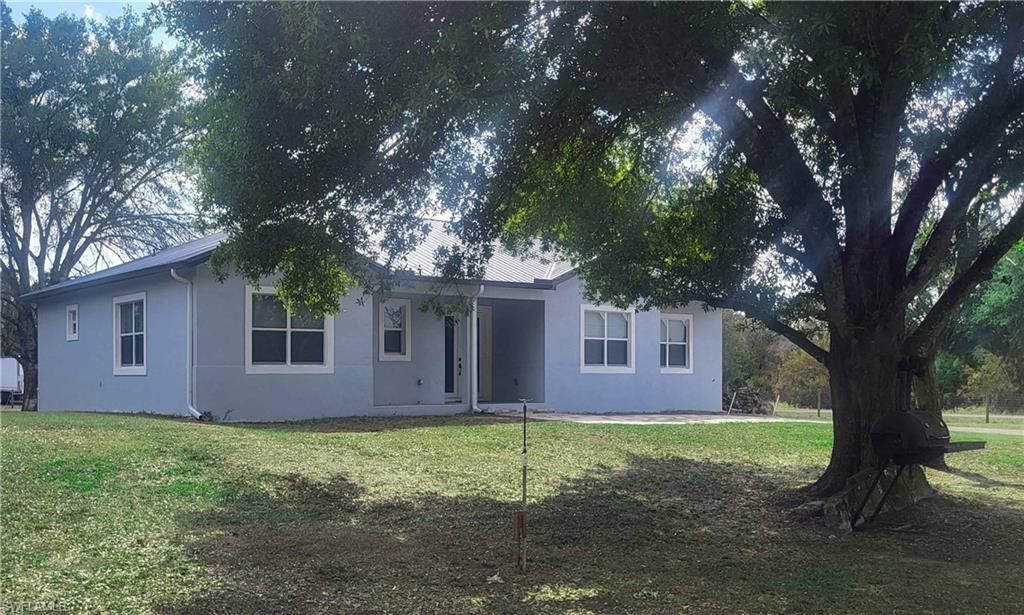 Photo of 548 Bald Cypress AVE, CLEWISTON, FL 33440 (MLS # 226017889)