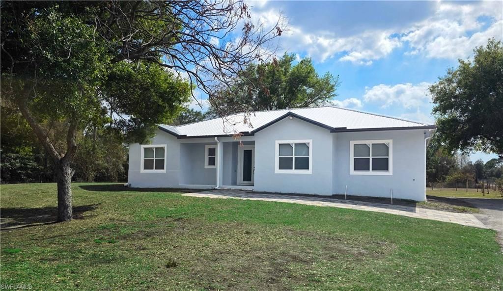 Photo of 548 Bald Cypress AVE, CLEWISTON, FL 33440 (MLS # 226017889)