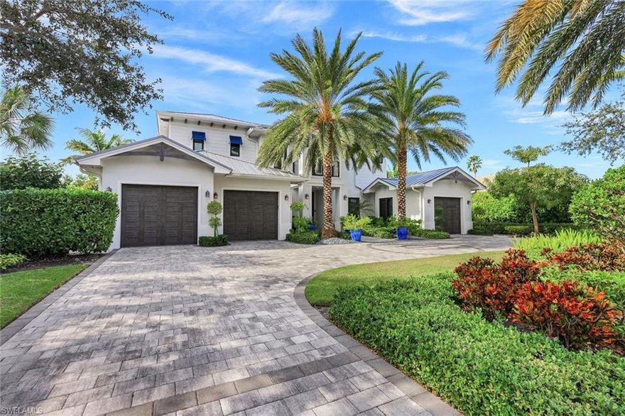 An award winning masterpiece nestled within the premier Moorings neighborhood of Naples, can be yours for the taking. This unique estate stands as a true testament to elegance and sophistication. Every detail has been meticulously crafted to provide the utmost in comfort and opulence along with a lifestyle of unparalleled luxury that embraces the outdoors by showcasing within. The lavishly designed open kitchen features custom cabinetry, a walk-in pantry, two multi-functional islands & Wolf, Asko & Sub-Zero appliances. A first floor master suite complete with walk-in closets, hidden laundry & a spa-like bathroom provides for the perfect oasis to unwind. Boasting three additional guest en-suites that are greeted by the 2nd floor living area and balcony overlooking the lush landscaped pool area allow for the utmost spacious and serene experience for visitors. The outdoor living is nothing short of extraordinary - featuring multiple covered lanai areas, summer kitchen, fire feature, gas heated pool/spa and plenty of gathering spaces to enjoy at your leisure.