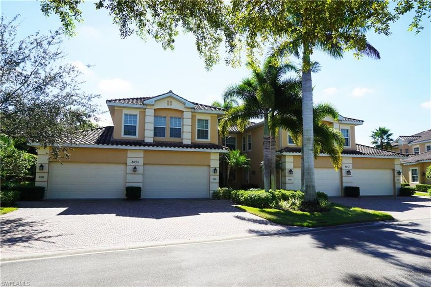 UNIT PRICED TO SELL BUT OWNER SAYS BRING ALL OFFERS! This first floor spacious coach home is located in the gated neighborhood of Champions within Lely Resort. It features 2 bedrooms, large open den, 2 baths, attached 2 car garage and screened lanai with a wonderful golf course view. This eastern exposure will give you a view of the sunrise and avoid the afternoon sun on the lanai, which is great for entertaining. The kitchen features beautiful quartz counter tops, roomy breakfast nook, island and pantry. Bedrooms have new carpet and upgraded padding. All windows and doors except one small window are impact glass and in addition there are electric hurricane shutters on the back lanai for added convenience and privacy. This unit is located directly across from the community pool, spa, bbq grills and even a clubhouse room that can be reserved for owners. NO MANDATORY MEMBERSHIP! You are NOT required to join any clubs with this purchase however you can choose to join The Players Club & Spa, The Classics Golf Club or both should you desire. Lely Resort is situated on 3,000 acres and offers 3 championship golf courses, running/walking trails and gorgeous lakes and preserves.