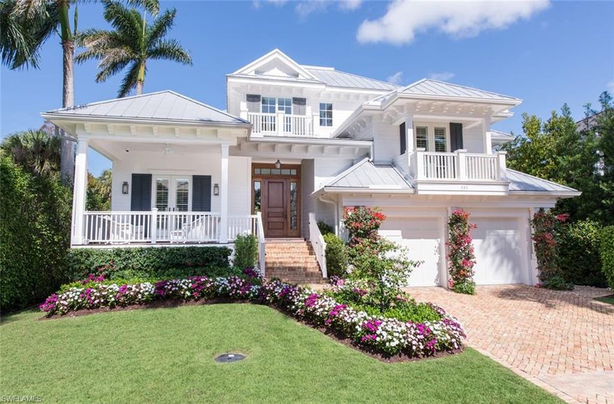 Gorgeous custom home on one of Old Naples’ most desirable southern streets. A gracious front porch leads to a dramatic two-story paneled foyer. Solid walnut flooring grounds a thoughtful floor plan that is open and extremely livable. A designer interior includes luxury finishes throughout. This elegant home features a 1st floor master suite with a luxurious marble master bath, a den with custom built-ins, three generously sized upstairs bedrooms with en-suite bathrooms and covered balconies, a powder bath and a pool bath. The gourmet kitchen features a custom marble island table, Subzero and Wolf appliances, two dishwashers and wine refrigeration. The outdoor living area in the rear features a covered lanai with motorized screens and an outdoor kitchen, dining area and fireplace with seating area. The large saltwater pool and spa, with shell stone deck and outdoor shower complete the oasis. Storage abounds, with ample closets, cabinets and a dedicated utility/storage space. An oversized 2 car garage provides plenty of room for work space. Additional features include a Sonos surround sound system, a 1000 gallon LP tank, Hardie Board fiber cement siding and a 22KW standby generator.