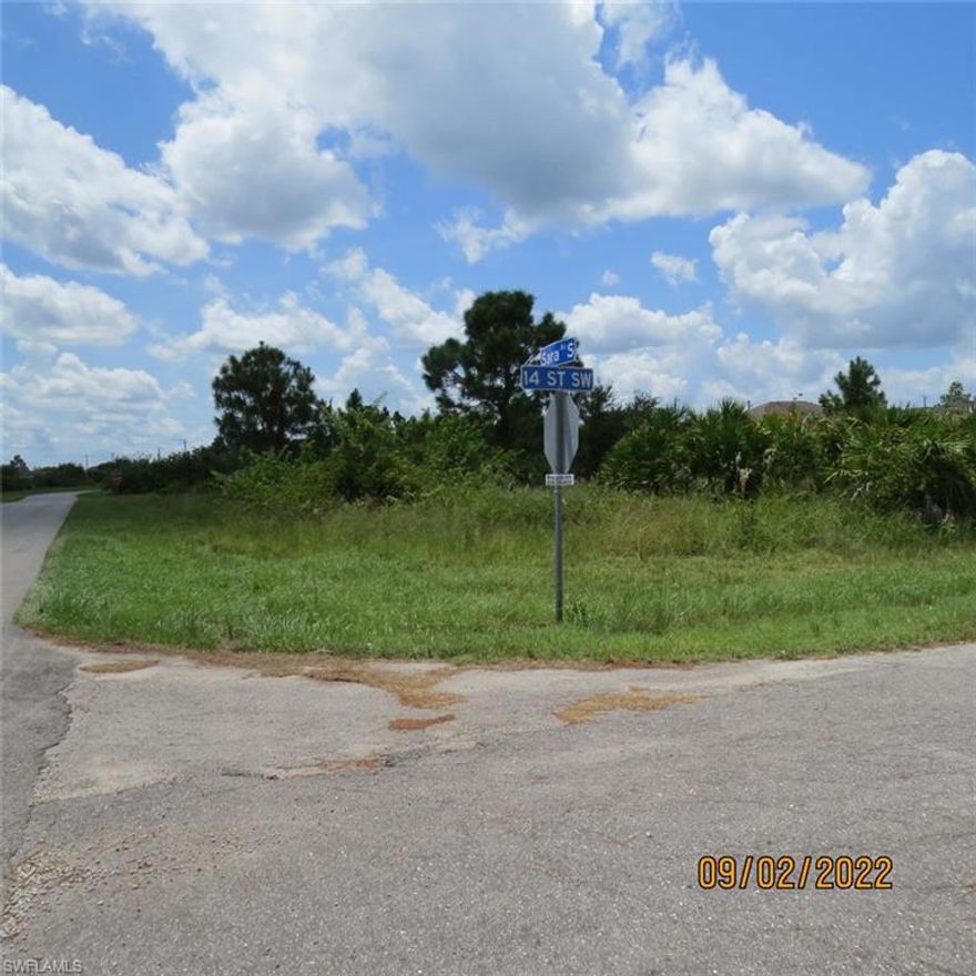A beautiful vacant lot is located in a quite desirable Southwest Lehigh Acres and is ideal for your to build new home. It just a few minutes from Gateway Charter School, RSW airport and I-75.  The corner lot back to it, is also listed on MLS and available to be purchased together to give you 1/2 acre. Don't miss this opportunity to buy while prices are still affordable.