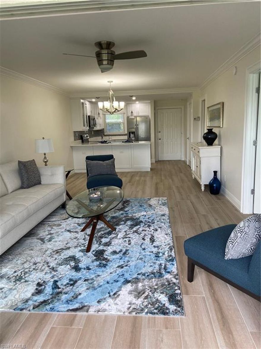 Truly this unit has it all! Incredible location and fabulous renovations! This beautiful first floor unit has amazing views of the immaculately landscaped High Point Country Club golf course. This community offers golf, bocce and pickleball all within walking distance of Naples famous white sand beaches and a short drive to 5th Avenue restaurants and shopping. This stunning unit has an open floor plan complete with a large breakfast bar, white shaker cabinets with opaque glass, quartz countertop and new stainless steel appliances.  Wood grain porcelain tile throughout (no carpeting!), crown molding, neutral fresh paint colors, six panel doors, laundry area and extra storage unit. Both the master and guest baths have been fully updated.  The master bedroom is spacious with a walk in closet. Relax by one of the six pools in the complex or meet friends for FREE golf on the par 3, 9 hole course. The club house offers an active community events calendar, gym and library. This is a  55+ building, and requires a 2 year no rental policy post ownership to maintain community consistency. Relax enjoying all the amenities of owning  a gorgeous newly renovated home in the High Point Community.