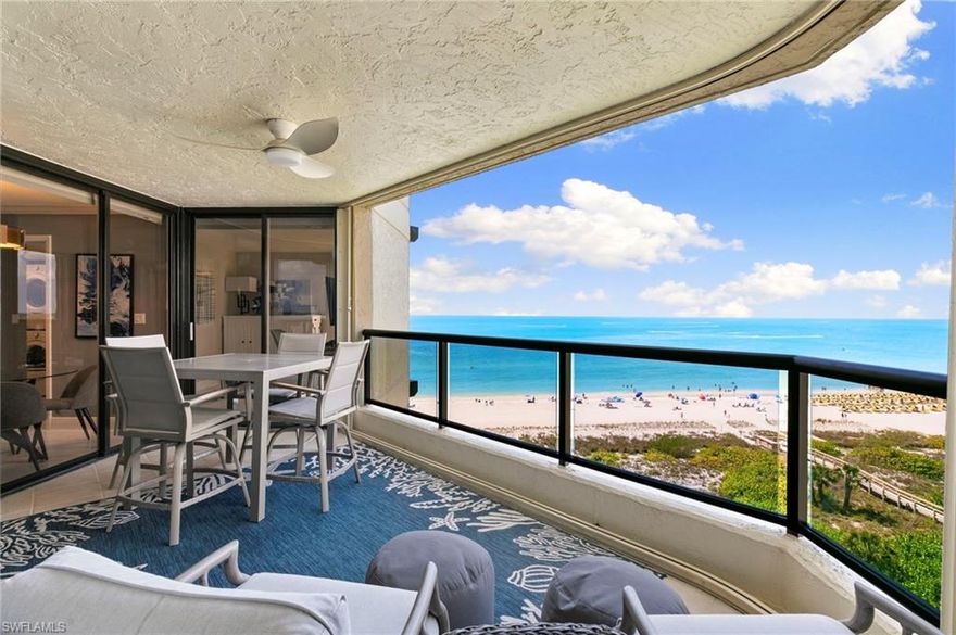 Beautiful beachfront condominium in Sandcastle I, offering breathtaking, unobstructed views of Marco Island’s iconic crescent beach and the sparkling Gulf from every room. This light-filled residence showcases a spacious open layout designed to maximize the spectacular coastal scenery.

The updated kitchen features contemporary cabinetry, granite countertops, stainless steel appliances, and a convenient breakfast bar—perfect for casual dining or entertaining. Both bathrooms have been tastefully updated with modern finishes. The primary suite offers an inviting retreat with dual vanities, neutral-toned rectangular tile, a large walk-in shower with a frameless glass enclosure and decorative listello, and an open walk-in closet.

Step out onto the expansive Gulf-front balcony to experience Marco Island’s famous sunsets and soothing Gulf breezes year-round. Recently painted and offered furnished, this residence is truly move-in ready and ideal as a personal beachfront retreat or a strong investment opportunity.

Sandcastle I is a well-managed, highly desirable beachfront community with professional on-site staff and exceptional amenities, including tennis courts, a large resort-style pool, outdoor grills, shuffleboard, a fitness center, a library/computer room, and a community room.

Perfectly located across from popular restaurants, boutique shopping, Marco Movies, and several major beachfront hotels with vibrant dining and beach bars. Sandcastle residences are known for their strong seasonal rental demand, making this an outstanding opportunity to enjoy the Marco Island lifestyle while generating income.