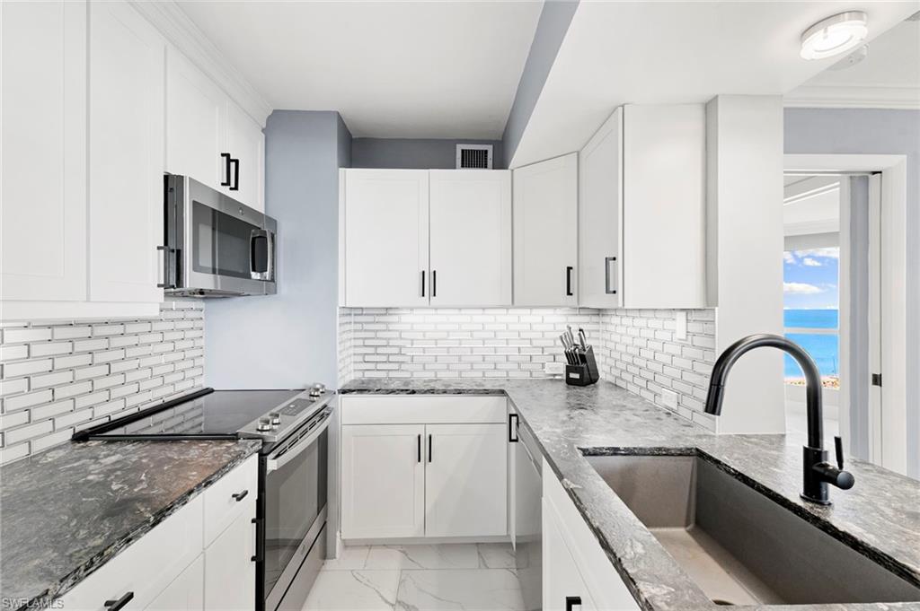 SANDCASTLE AT MARCO BEACH - Residential