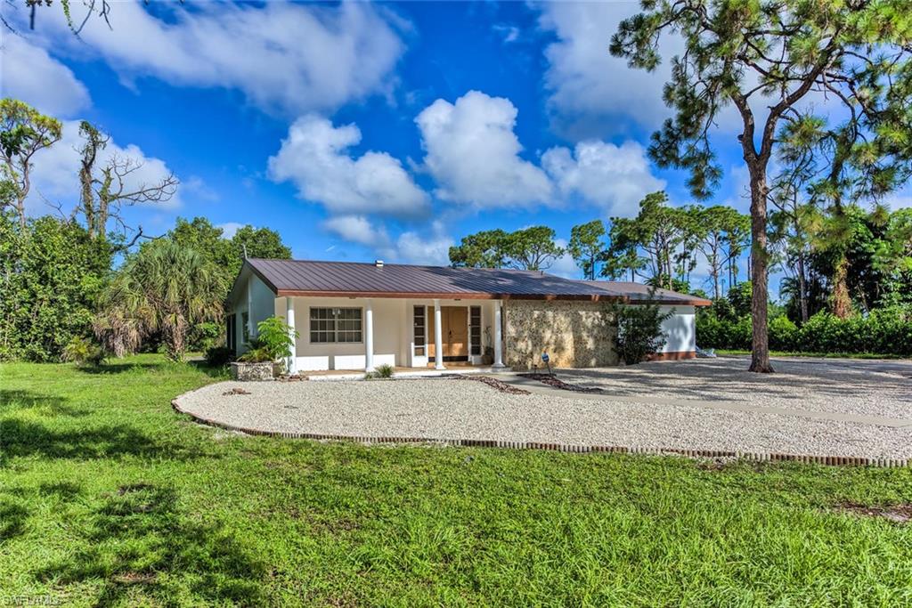 Photo of 29 Caribbean RD, NAPLES, FL 34108 (MLS # 226024780)