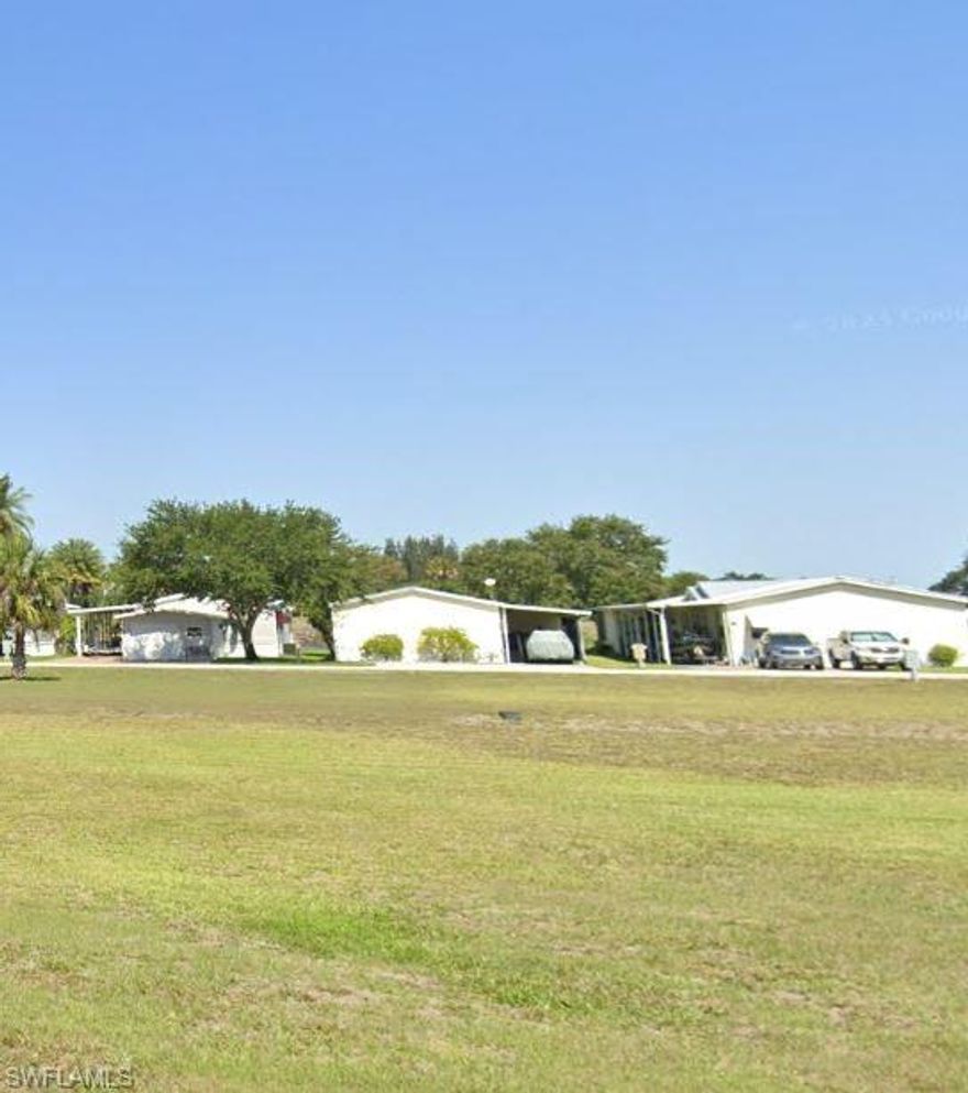This is wonderful opportunity to own a .125-acre vacant lot in Moore Haven Yacht Club, a 55+ Residential Manufactured Home Community. This community offers the unique advantage of owning your lot with City Water and Sewer connections. This provides a serene and welcoming environment for its residents. 
As a member of the Homeowners Association, you will have access to a range of amenities, including the use of the Clubhouse Facilities, Swimming Pool, planned Activities, and lawn mowing service. 
Don't miss out on this opportunity to become a part of this vibrant and active community.