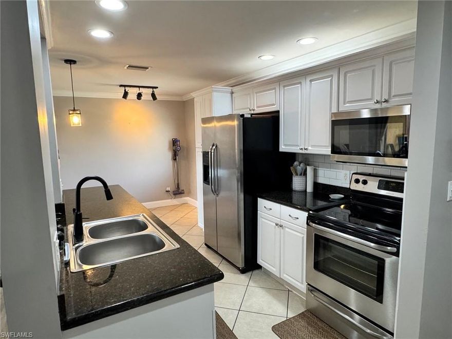 This is a potential Short Sale and subject to third party approval. 

Experience elevated living in this stunning 5th-floor condo, where 1,092 square feet of open-concept design meets sweeping panoramic views. This maintained 2-bedroom, 2-bathroom residence offers a seamless blend of style and comfort, featuring crown molding, durable laminate flooring, and a newer HVAC system for year-round peace of mind. The kitchen serves as the heart of the home, fully equipped with granite countertops, a classic subway tile backsplash, stainless steel appliances, and a built-in water filtration system.

Step through the spacious living area to your private, screened-in lanai...the perfect vantage point to enjoy the Florida breeze and incredible elevated views. For added convenience, this unit includes a designated carport parking spot and access to on-site community laundry facilities, while the community itself boasts a resort-style pool and lush tropical surroundings. Perfectly situated for the active lifestyle, you are close to I-75, providing quick access to the area’s best shopping, dining, and restaurants. Whether you are seeking a full-time residence or a seasonal retreat, this move-in-ready condo offers the modern upgrades and prime location you’ve been searching for. Schedule your private showing today!