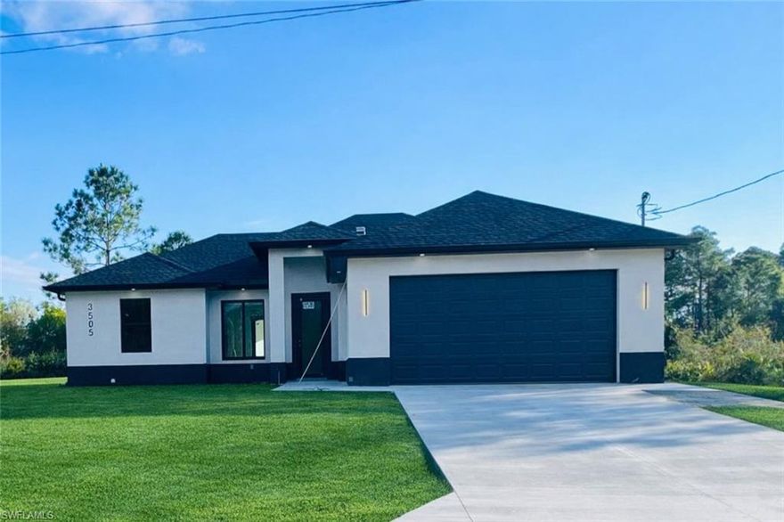Brand new construction! This beautiful single-family home in Lehigh Acres sits on a spacious 0.25-acre lot and features 3 bedrooms and 3 full bathrooms—one conveniently located in the garage, offering flexibility for a future 4th bedroom, in-law suite, or rental efficiency. The home boasts impact-resistant doors and windows, central electric A/C, and ceiling fans in every bedroom for year-round comfort. Enjoy relaxing on the front or back porch, and impress guests with the modern kitchen complete with a large island, ample pantry space, and contemporary finishes. A perfect blend of comfort, style, and functionality—ready for your personal touch!