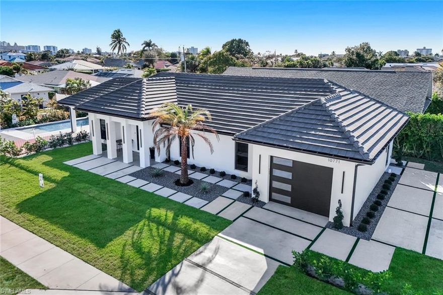 Imagine walking to the beach or strolling miles of white sugar sand! 
You can, from this Boldly designed 3 bedroom plus a private den lending innovative architecture with a soft modern aesthetic topped with a strong investment potential! It’s completely renovated from top to bottom, inside and out… just like a brand new home which offers approximately 1,700 square feet of pure creativity and craftsmanship with open floor plan featuring high ceilings. 
This home stands apart with one-of-a-kind interior architectural details, featuring dramatic ceilings that add volume and visual interest throughout. On-trend real oak wood flooring flows seamlessly throughout grounding the modern design with an urban twist. 
The Custom kitchen is the heart of the home boasting an expansive  stunning quartz island complemented by upgraded premium LG Studio appliances. 
Designer touches include recessed lighting in shower niches, plus washer and dryer housed behind Contemporary sleek Black glass doors. These carefully curated finishes reflect an exceptional level of detail rarely seen today. 
A private entry flex space provides outstanding versatility ideal as a secluded home office, creative studio, gym, or kid zone adding functionality without compromising design. Outdoor living is equally compelling, featuring a heated saltwater pool with preferred southern exposure. 
Just minutes from the beach, dining, and fabulous shopping.  This home offers a compelling opportunity as a primary residence, seasonal retreat, or income producing investment in one of Naples’ most desirable coastal neighborhoods just 12 blocks to the beach, near the Ritz, La playa Beach Club and dining on the sand at the Turtle Club, Baleen or enjoy a casual bite at the Light House. Everything is at your fingertips, from tennis and pickle ball to movies, Whole Foods, and Mercato for dining, shopping or entertainment. 
Enjoy the Naples lifestyle you have dreamed of!