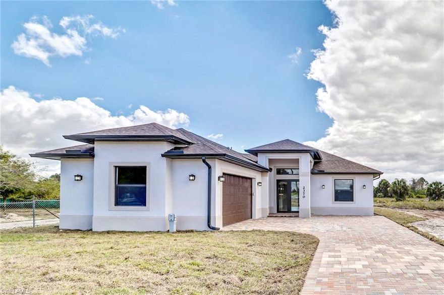 Make this home yours now!! It will feature a spacious open floor plan with 3 bedrooms, 2 baths, custom kitchen cabinets, tile floors throughout the house, granite counter tops in kitchen and bathrooms, stainless steel appliances, and a 2 car garage. The distinguished master bedroom will have a HUGE walk-in closet and the spacious master bath features a an over-sized walk-in shower, and dual sinks. The new Publix located at Immokalee and Randall is less than 2 minutes away!! Home is also close by the new 150-acre park which will be located next to the Collier County Fairgrounds. This property is only available to the buyer who acts NOW!! Stop reading and start calling!! PLEASE NOTE: Pictures in MLS are of Model Home from Builder.