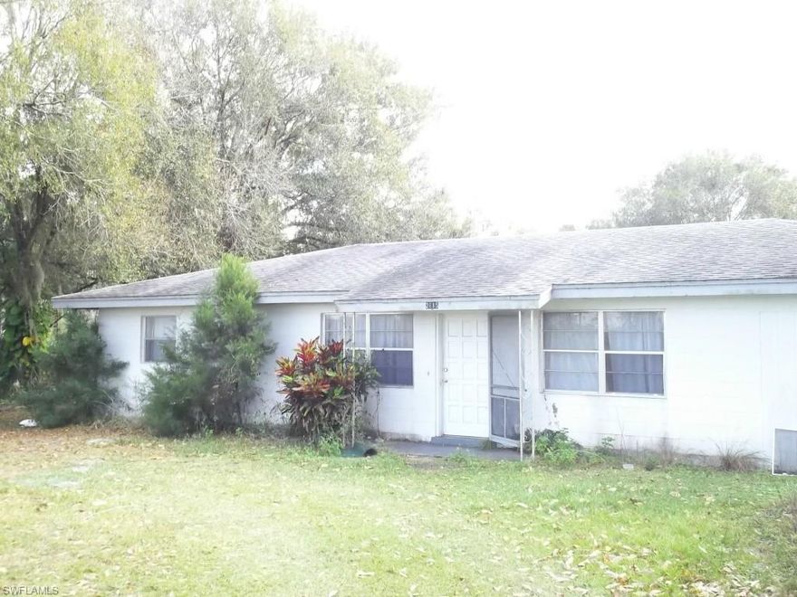 Country living  with approximately 30.5 acres on Prairie Creek.   Property has wooded and cleared areas as well as an existing 2 bedroom, 1 bath home that could be occupied or build a new country estate.