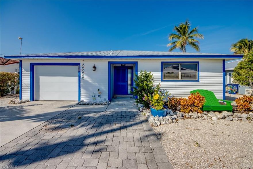 DIRECT GULF ACCESS in northern Bokeelia.  This home is in a primo location with quick access to Jug Creek, Charlotte Harbor and PIne Island Sound.  Minutes from the Gulf of America.  This 2/2 plus den home has an open floor plan with a beautiful with center island and loads of storage space.  There is an extra room for a den, hobby room, or home office.  Large lanai, large sun deck, water feature, boat dock with a canopy and so much more.  Pine Island is known for its great inshore and offshore fishing, boating, nature watching for birds, dolphin and mullet jumping.  A true nature lover's paradise in the beautiful sunshine state.  Seller has a flood policy that is transferrable to the buyer.